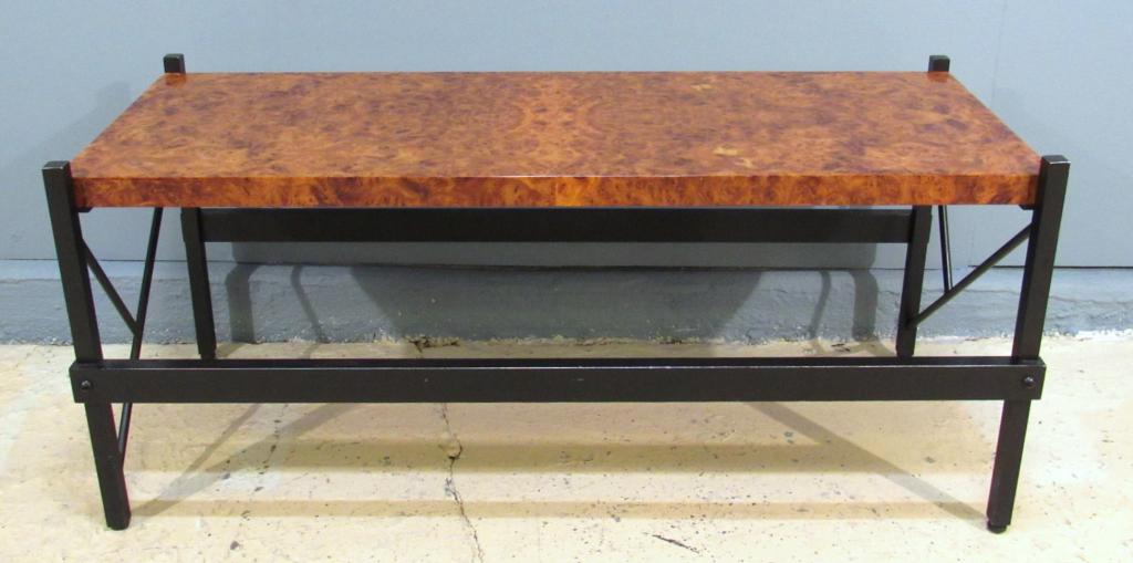 Modernist Metal Framed Coffee Table: Burled wood top on artistic ebonized metal base. 48" X 21" X 21"h