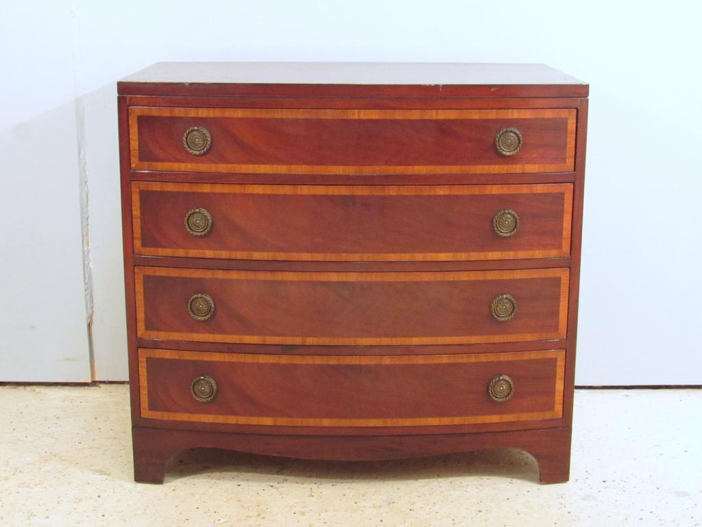 Hepplewhite Style Bow Front Chest by Sligh: Mahogany with cross banded drawer fronts. 36" X 23" X 33"h. (West 70th Street, NYC Estate)