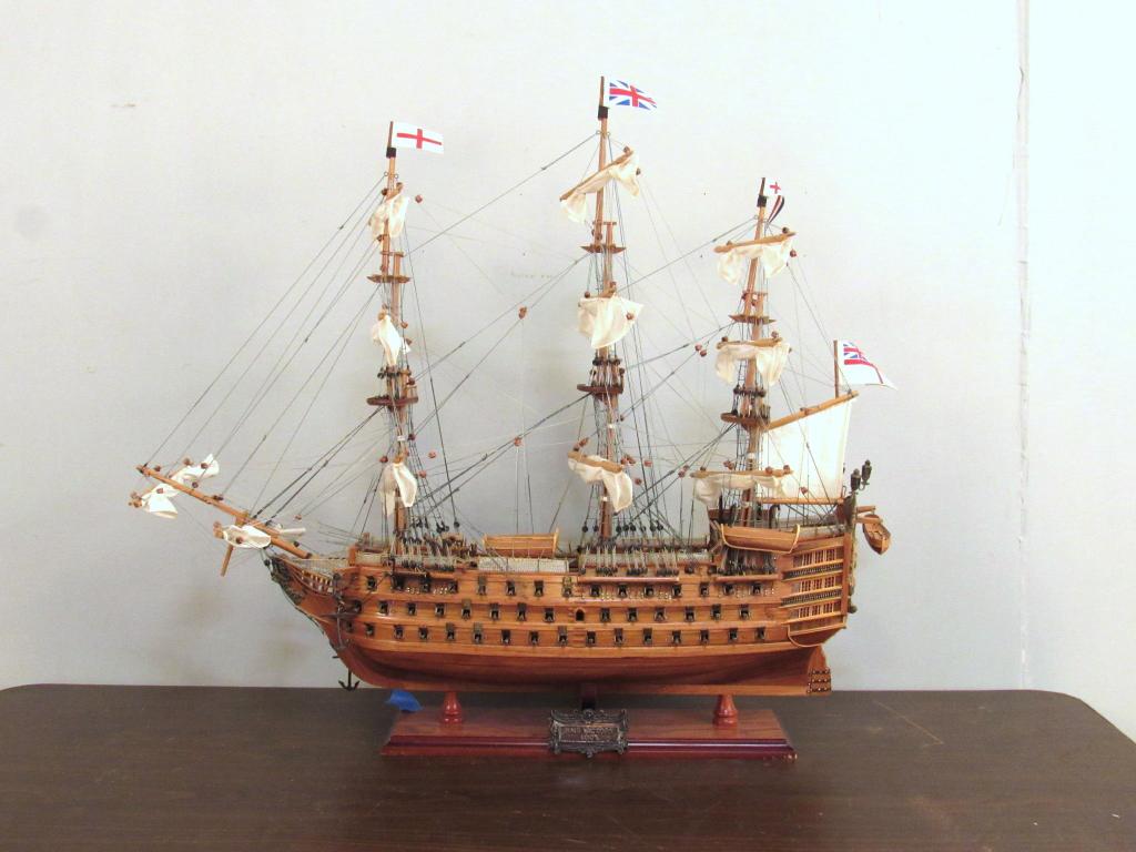 Ship Model of the HMS Victory: Fully strung and chained with flags and cannons, attached to stand. 30" X 9" X 26"h. (A North Salem, NY Estate)