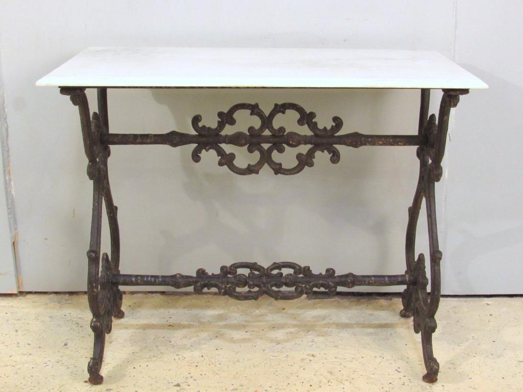 French Cast Iron Base Bistro Table / Console: Beveled marble top (not original) on a Vintage cast iron base with gorgeous curls and upside down hearts. 36" X 19" X 29.5"h (Matching Previous Lot)