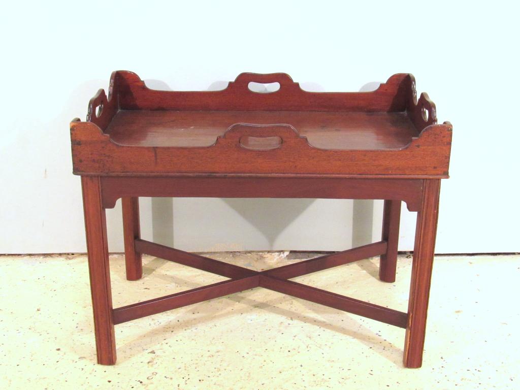 Antique American Butlers Tray Top: Antique rectangle sculpted top with 4 handles, dovetailed, atop a reproduction mahogany frame with stretcher base. 30" X 18" X 4.5" tray (30" X 18" X 22.5"h) (A North Salem, NY Estate)