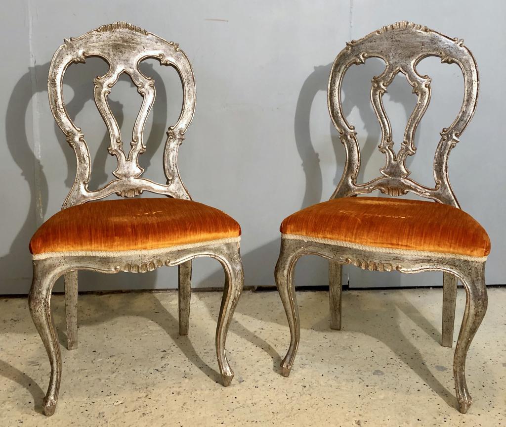 Pair Italian / Portuguese Silvered Side Chairs: Carved in the Grotto Fashion, upholstered seats. 22" X 16" X 40"h (From a Watertown CT Estate)