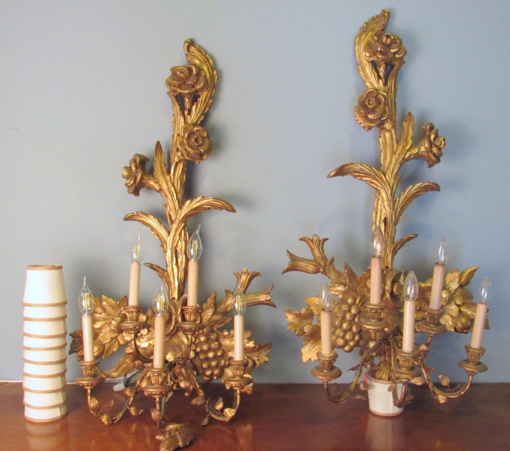 Pair Country French Gilt Carved Sconces: Each with 5 gilt metal arms. Gilt wood carving repaired, and one piece not attached. Floral designs, including 10 shades. 20" X 10" X 40"h (From a Watertown CT Estate)