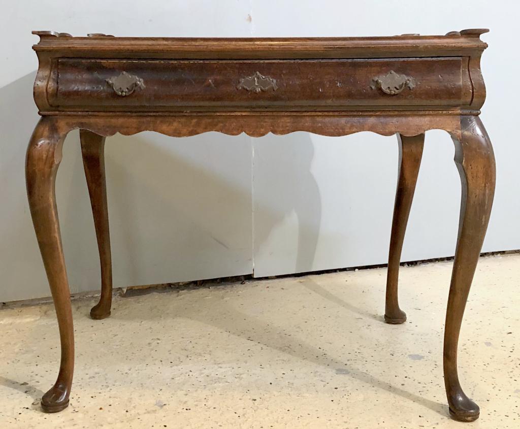 Queen Anne Style Tea Table: Full lips gallery with extended corners, 1 drawer over scalloped skirt, pad feet. 33" X 22" X 28"h (From a Watertown CT Estate)