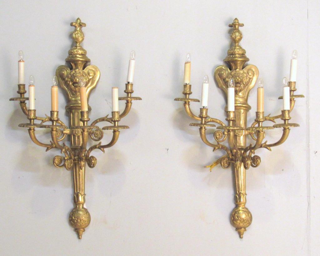 Pair Large French Style Bronze Sconces: 5 Arms each with scroll above roaring (open mouth) lion face backplate and trumpet arms and curls. 19" X 9" X 32"h (From a Watertown CT Estate)