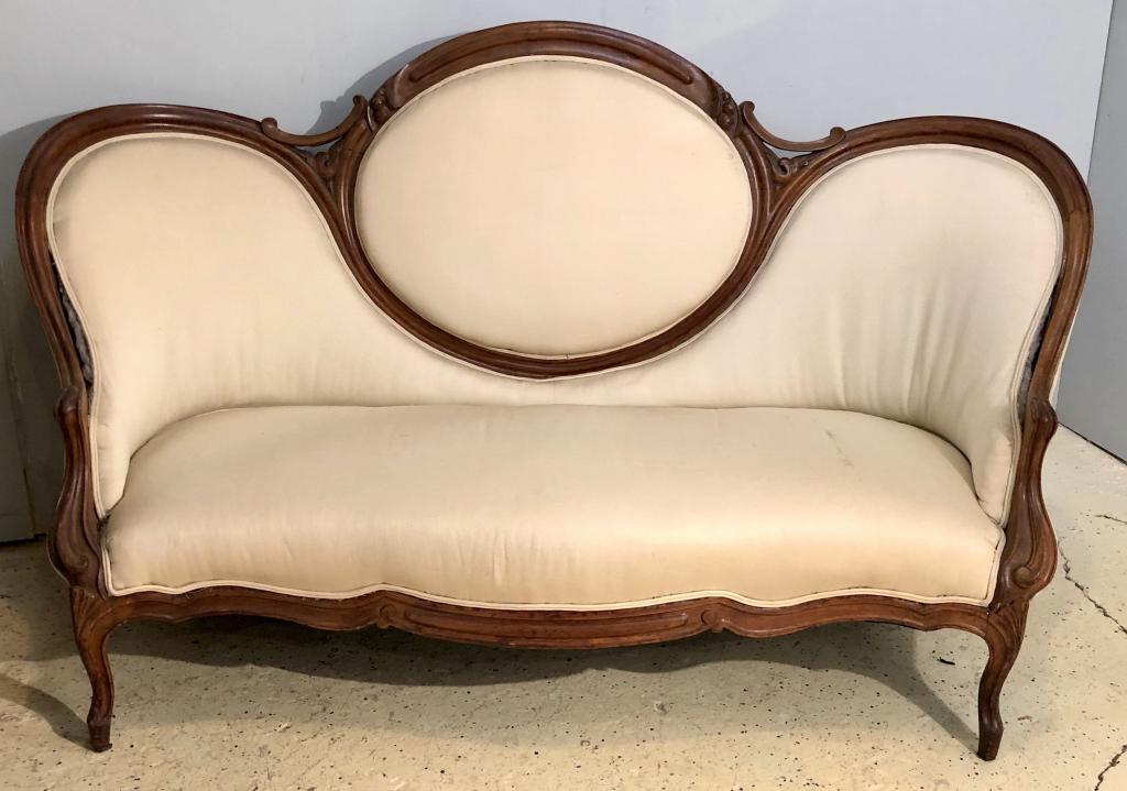 Victorian Style Finger Molded Sofa: Carved mahogany in the Belter Manner with carved finger molding and flowers. Frame needs tightening. 70" X 31" X 41"h