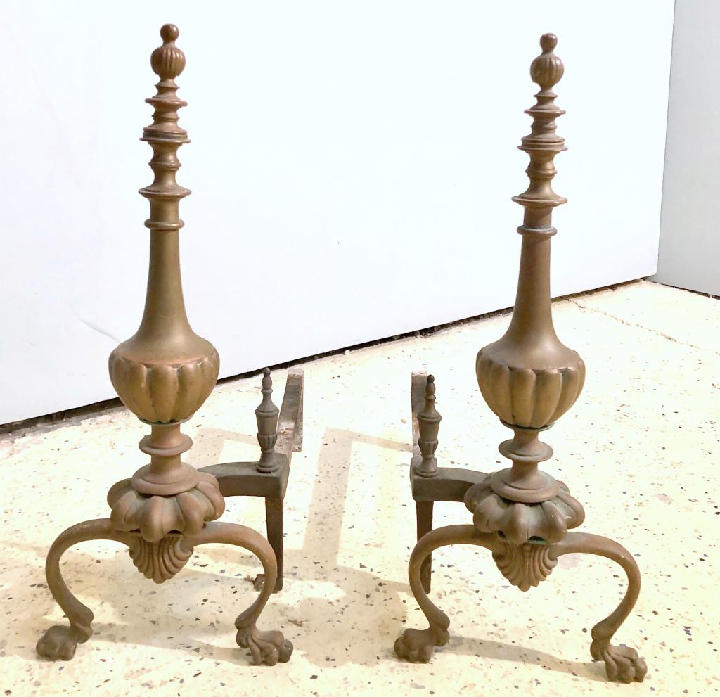 Pair Federal Style Brass Andirons: Fluted ball finials on reverse fluted urn, over bulbous collar and front deco flora, ending on paw feet. 9" X 18" X 21"h