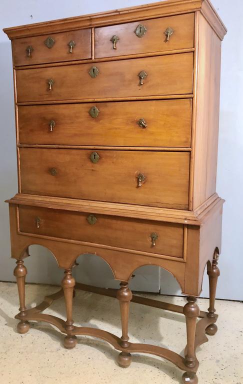Antique American William and Mary Chest on Stand: 2 part chest; 5 drawer upper section with crown molding, over a single drawer base with high legs of flute and cover design, outer stretcher and bun feet. 41" X 21" X 64" (From a Tarrytown NY Estate)