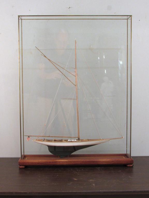 Ship Model of an American Schooner Yacht: Flowing flag with full roped mast, fine detailed deck, in glass case. 24" X 5.5" X 31.5" (From a Greenwich CT home)