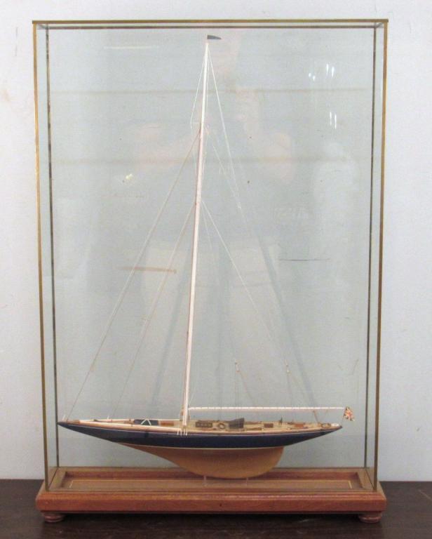Ship Model of a British Schooner Yacht: Fully roped single mast with British flag flying from finely detailed deck. 20.5" X 5.5" X 29"h (From a Greenwich CT home)