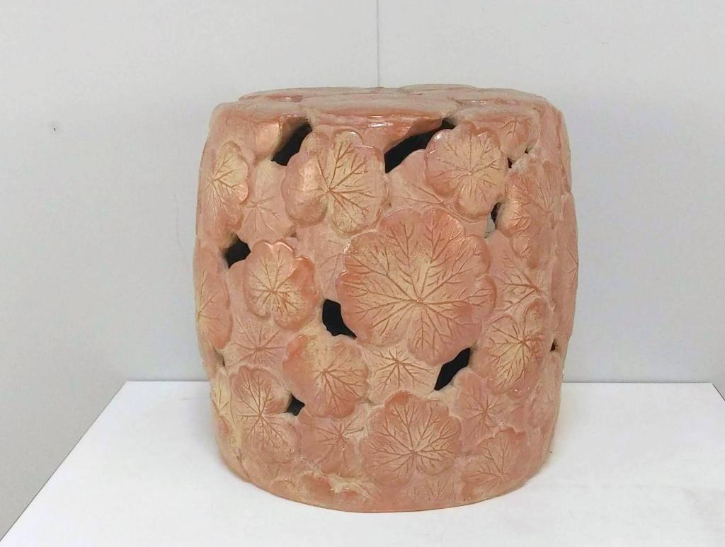 Pink Glazed Chinese Garden Seat: Lilly pad design, a few chips. In Squat form. 18"dia X 16"h.