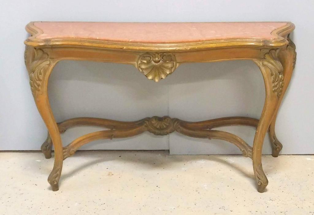 Louis XV Style Console: Inset serpentine marble top over carved wood base with lower stretcher. 59" X 20" X 32"h