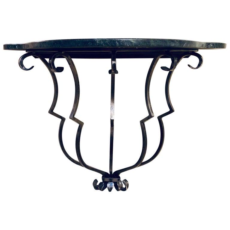 Yale Burge Marble-Top Console: Art Deco style metal base. 28" x 35.75" x 16.75"