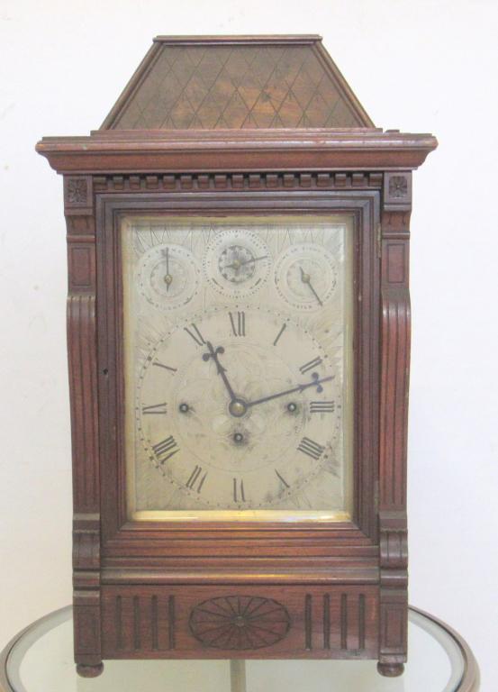 English Victorian Large Mantel Clock ****: Mahogany case, as is. Westminster chimes. Presently locked, no keys. 15" x 9" x 25" **** Updated Pictures showing back interior, which we obviously have the key for now.