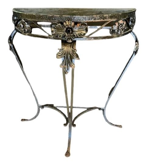 Steel & Glass Console Table: Steel and glass top. Floral design. In good condition. Minor fading. Wear consistent with use. Measures: 25" h x 21" w x 8.5" deep.