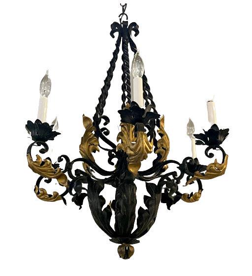 Wrought Iron and Gilt Metal: 6 arms. Wear is consistent wit age and use. Minor fading. Good condition. Measures: 32" x 26.5" dia