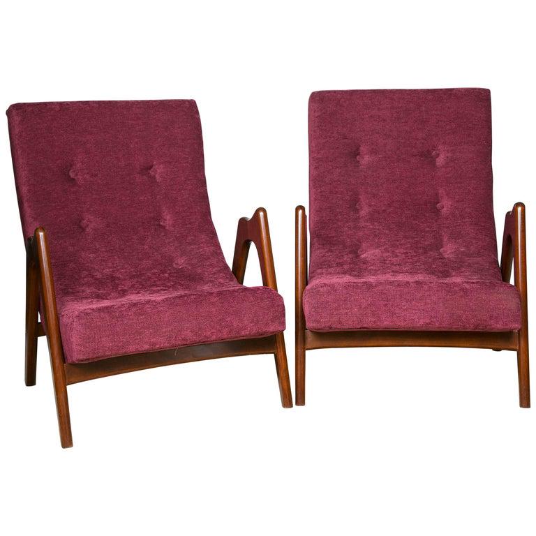 Pair of Mid-Century Modern Armchairs: Pair of newly upholstered Mid-Century Modern armchairs. Recently acquired from a shopping trip overseas are one of four pair of Mid-Century Modern arm lounge chairs each in a different brand new uphol