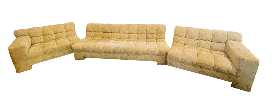 Pair of Custom Couches: Wear is consistent with age. Loose thread. Good condition. Couch with arms measures: 100" length x 38" deep x 29" h Seat height: 17" (From an 870 UN Plaza Estate)