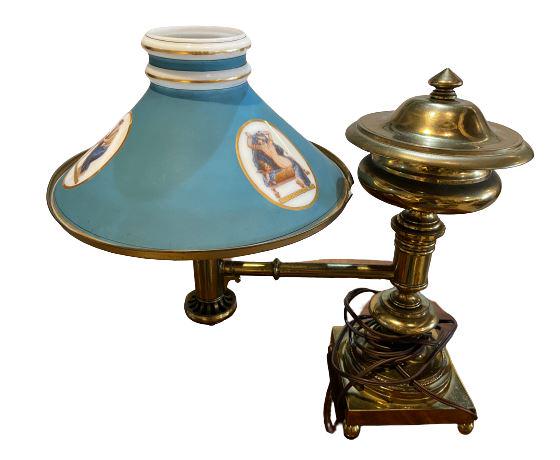 Blue Cherub Decorated Table Lamp: In great condition. Measures: 14" h x 16.5" w (From a 330 Central Park West Estate)We do not ship. We do not have staff to move items at this location. Please bring two men. All items must be removed 