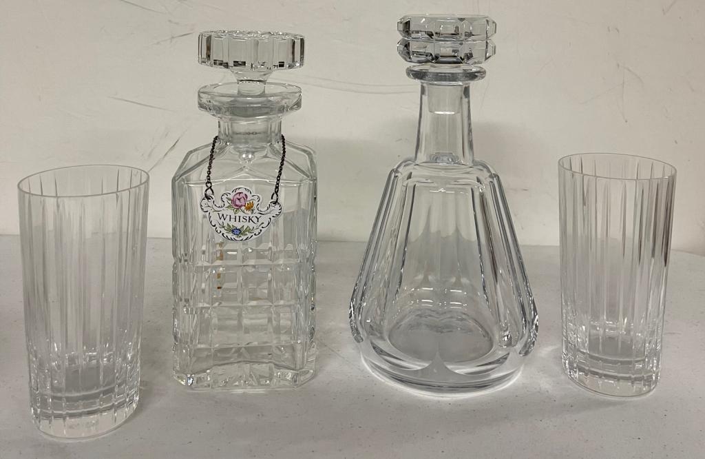 Two Whisky Decanters with 2 Glasses (Baccarat): Two Decantors one marked Baccarat and a pair of Baccarat Glasses. marked. 9 x 5 dia