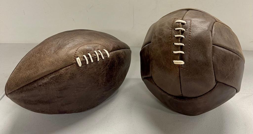 Lauren Two Leather Balls. Soccer and Football.: Both in fine distressed condition. Ralph Lauren. 9" dia