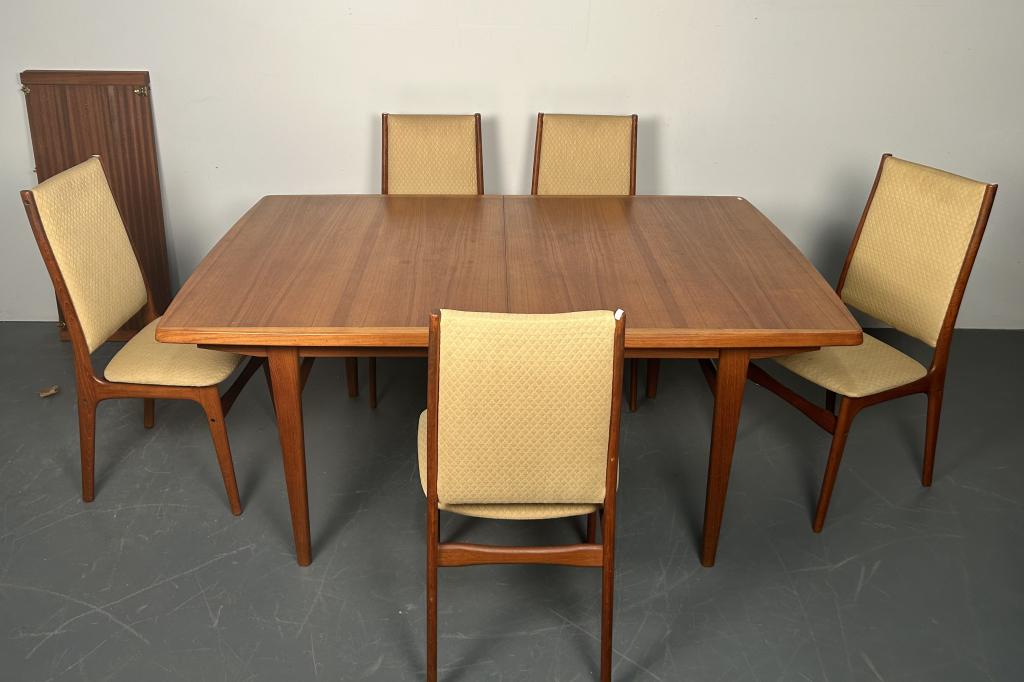 Mid Century Dining Table with Five Chairs: Mid Century Dining Table with Five Chairs. Dining Chairs: Height 37 Inches, Width 19 Inches, Depth 17.5 Inches, Seat Height 18 Inches. Dining Table: Height 29.5 Inches, Width 65 3/4 Inches, Depth 41 3