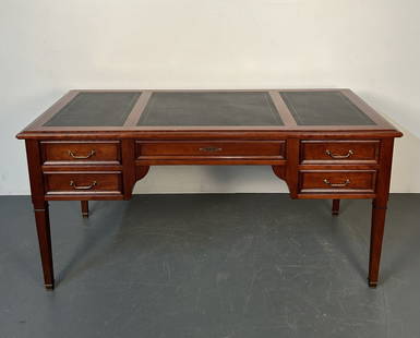 Grange Signed Louis XVI French Desk: Grange Signed Directoire French Desk. Stamped Grange. Handcrafted cherry wood with leather top original bronze handles, wooden nail pegs, center drawer, 4 side drawers and tapered legs. Height: 30.75