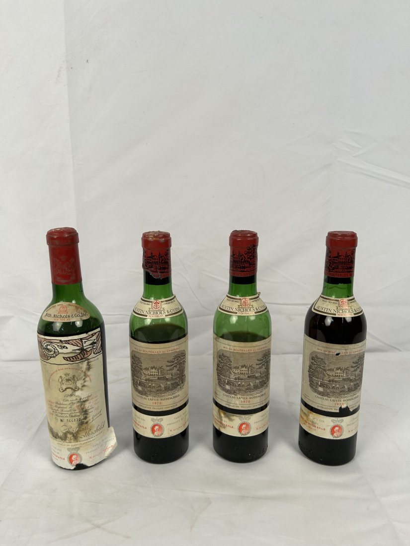 Collection of Four Chateau Lafite-Rothschild 375 ML Bottles of Wine: Collection of Four Chateau Lafite-Rothschild 375 ML Bottles of Wine. Collectible wine bottles. Selected and imported by Austin Nichols & Co. One 1966 bottle and three 1970s bottles. Sold as is.