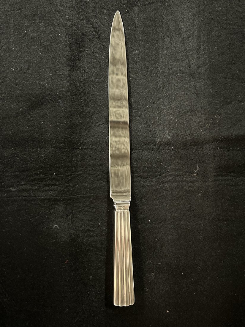 Georg Jensen Sterling Silver Knife: Georg Jensen Sterling Silver Knife. Length 13.5 Inches, Depth 1.5 Inches. Stamped Sterling Denmark.