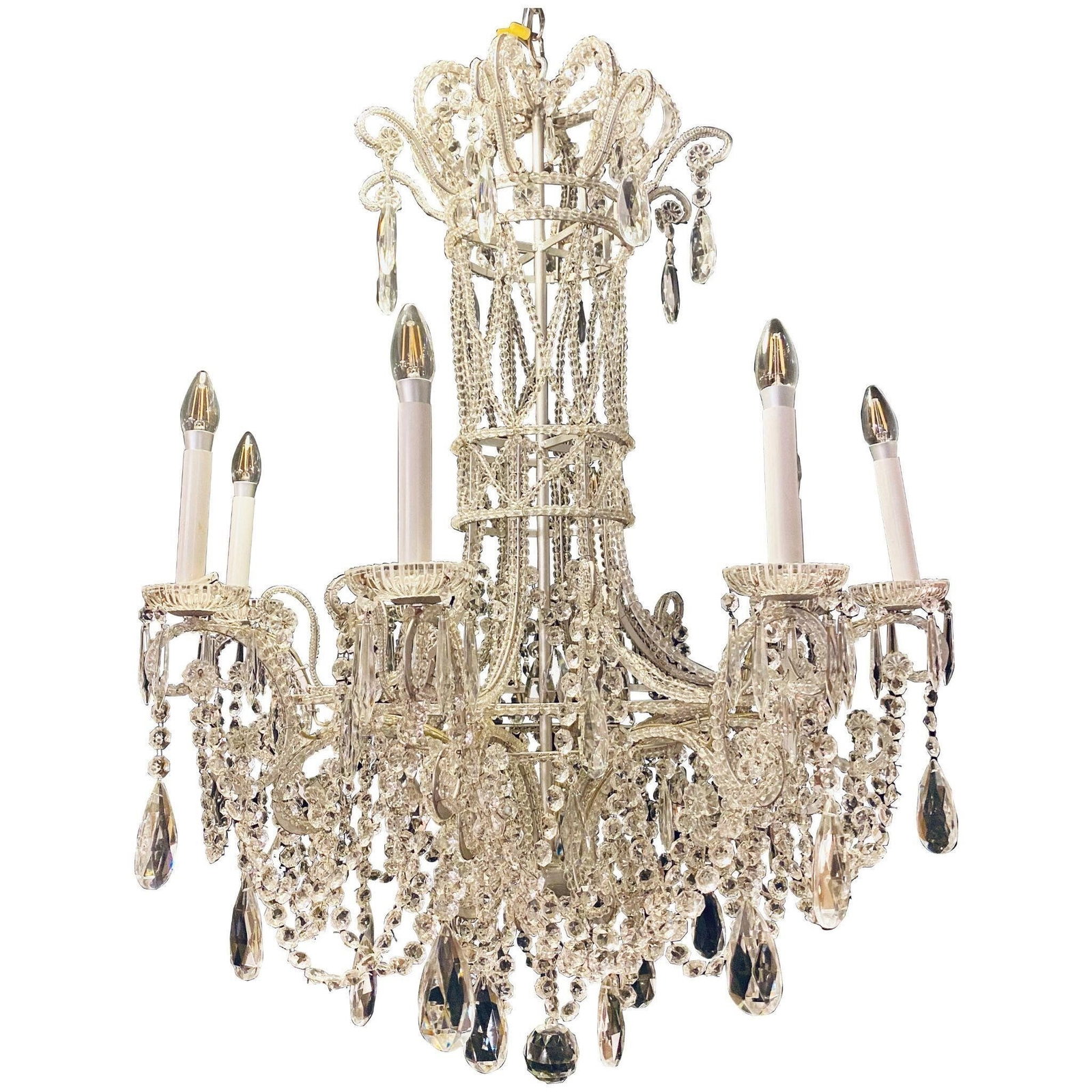 Silver Leaf Iron Chandelier with fine Crystal Bead: A continental silver leaf iron chandelier with fine crystal bead and pendant decoration. Quality rises up on this all crystal decorated chandelier. Large and impressive iron frame that is totally cove