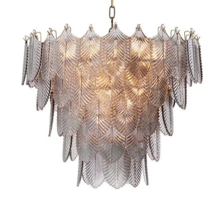 Art Deco Style Brass Chandelier by Eicholtz: Modern Art Deco Style Chandelier in Brass and Glass by EicholtzUpdate your existing interiors with the Verbier L Chandelier, a real highlight that can be integrated into any modern or classic furnishi