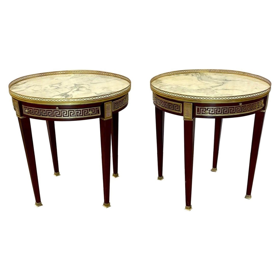 Pair of Louis XVI Greek Key Bouillotte Tables: Pair of marble top greek key bouillotte or end tables, manner of Maison Jansen.A pair of marble top Greek Key Bouillotte or end, side, lamp or center tables. Manner of Jansen in mahogany with double d