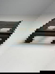 Wicker Painted Coffee Table: A wicker, painted coffee tableHeight: 19 inches Width: 40 inches Depth: 40 inchesFrom a Rye Estate