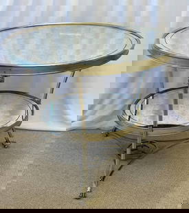 Hollywood Regency Mirrored Gueridon, Silver Gilt: Hollywood Regency Style Mirrored Gueridon, Center Table. A sleek and stylish Silver gilt gueridon having Lion head ringed tri pod base leading to claw feet. The shell having a lower and upper sliver