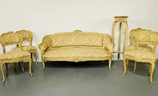 Louis XV Painted Suite: Settee, Chairs, Table: A Seven Piece Parcel Gilt and Painted Italian Salon Set circa 1900.Comprised of a settee, four side chairs, marble top table and pedestal. Sofa: 32.5" x 60.5" x 22.5" Seat: 16" $1900 Chairs: 33.25" x