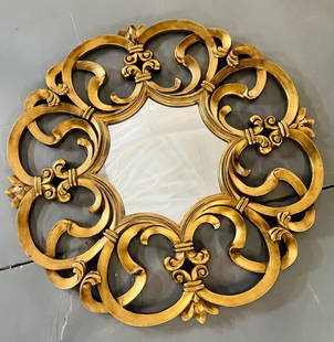 Circular Wall, Console or Pier Mirror Italian Gilt: Circular Wall, Console or Pier Mirror, Italian, Gilt Wood.The whole having a pierced gilt gold fame of circular design with a center mirror. The frame carved in the form of a kings crest. DimensionsHe