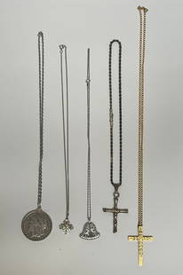 Group of Five Necklaces, Silver: Group of Four Sterling Silver and one gold plated necklace. Silver dollar dated 1884 O series.