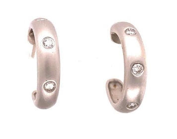 14Kt White Gold Three Diamond Stud Earrings