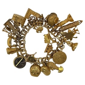14kt Gold World Traveler Charm Bracelet 70.64g