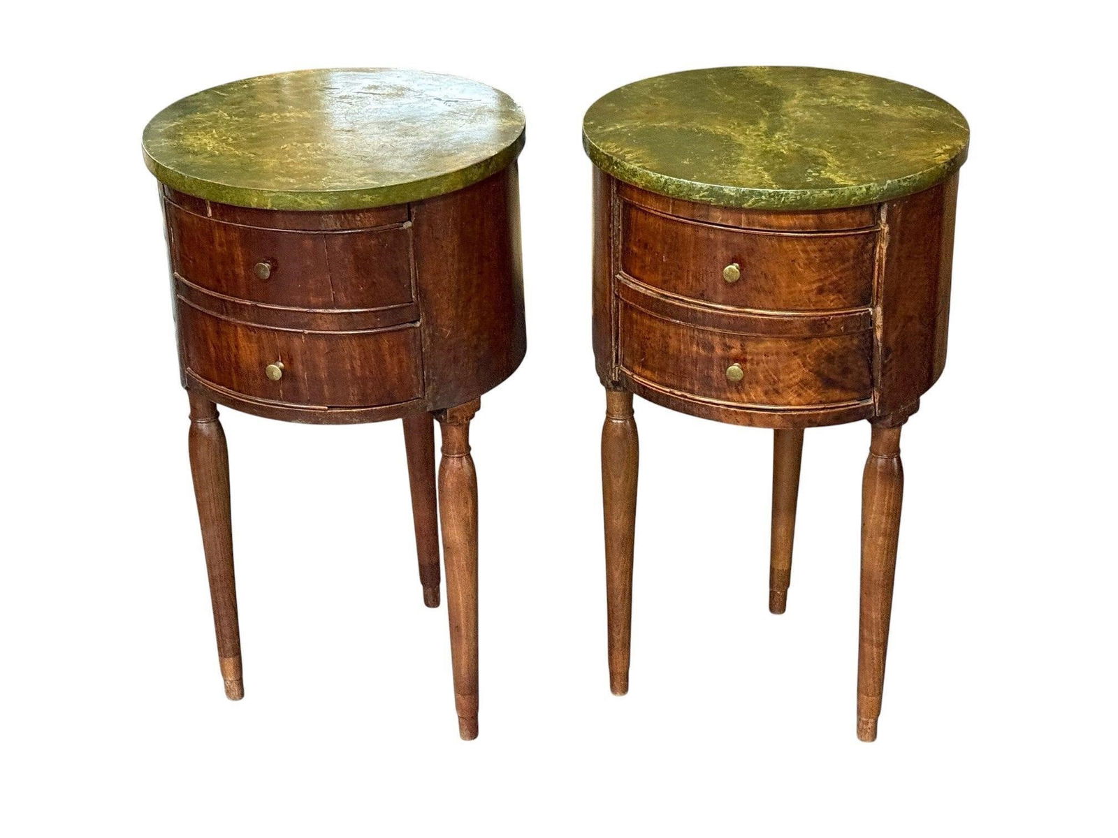 Pair of Round Antique Nightstands or Endtables: 18th/19th Century Each having two drawers and a faux painted top. Aged. Height: 26 inches, Diameter: 15 inchesFrom a Fine Rhode Island Waterfront Home