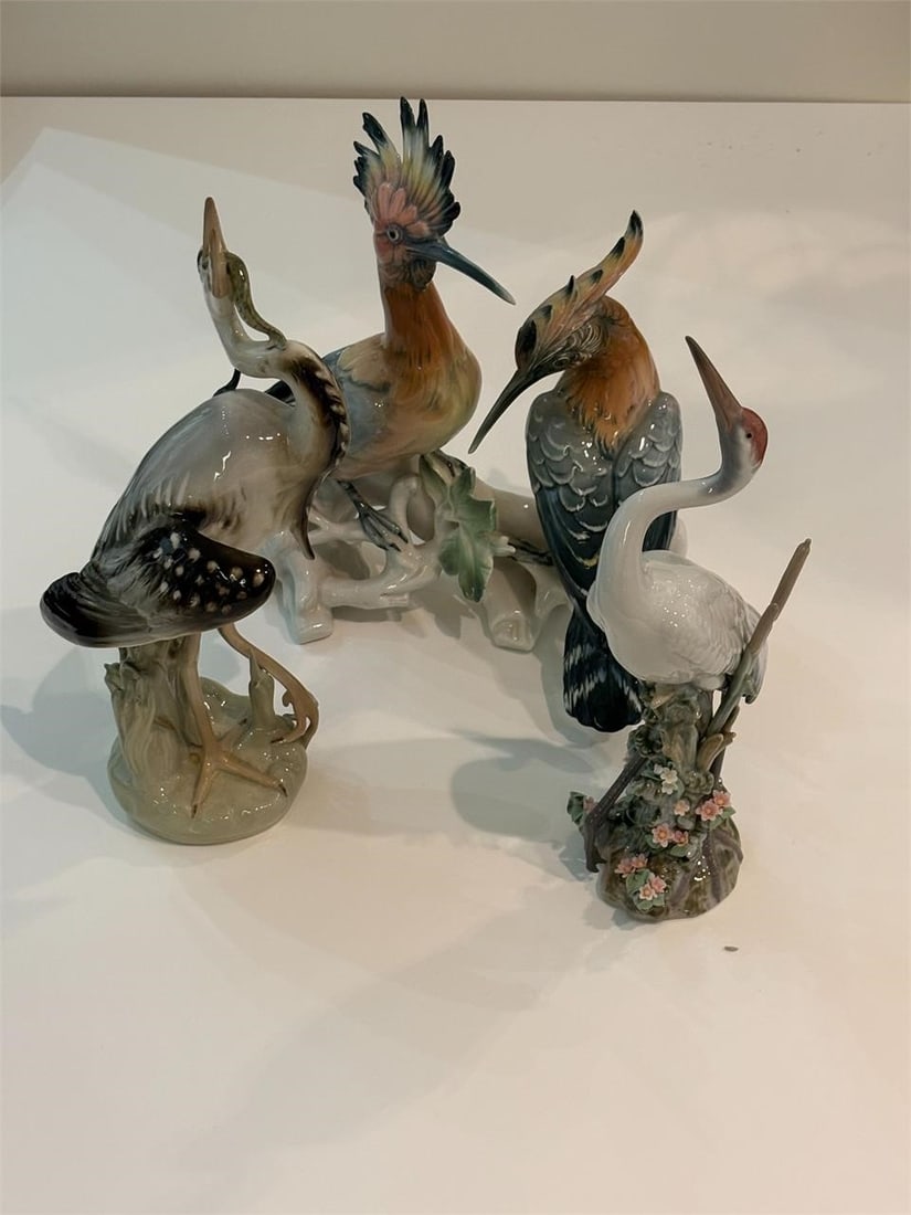 Group of Four Porcelain Birds: Four porcelain birds, the highest measuring 12 inches one with a Lladro stamp the other marked Germany all appeared to be in lovely condition