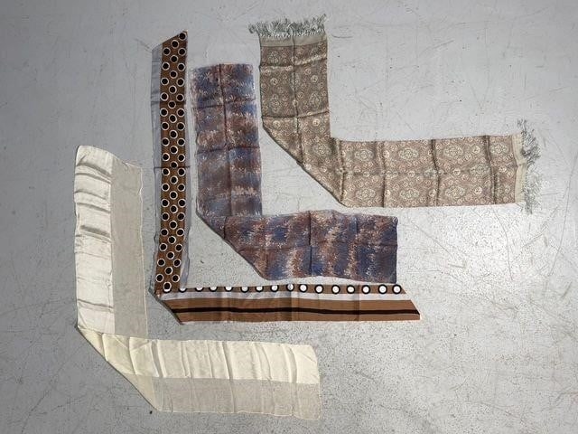 Four Vintage Patterned Silk Scarves: Four vintage patterned silk scarves featuring various designs like geometric circles and traditional motifs. Longest one: 84 x 6 inches