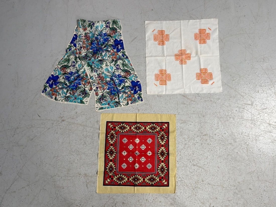 Three scarves: Floral Scarf (Top Left) features a vibrant "Botanic Splash" design. Size:55.5 by 14 inches.White Scarf (Top Right) features geometric patterns. With cancún wording. 22.25 inches square.Bandana