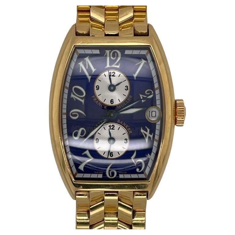 Franck Muller Master Banker 18K 166g Watch 5850 MB: Franck Muller Master Banker 18k Rose Gold/ Gold Blue Dial Men's Automatic Watch 5850 MBWrist Size: 6.5-7 inchesWeight: 166 gramsIndices: Arabic NumeralsCase Material:18k Rose gold/ Gold, case back sec