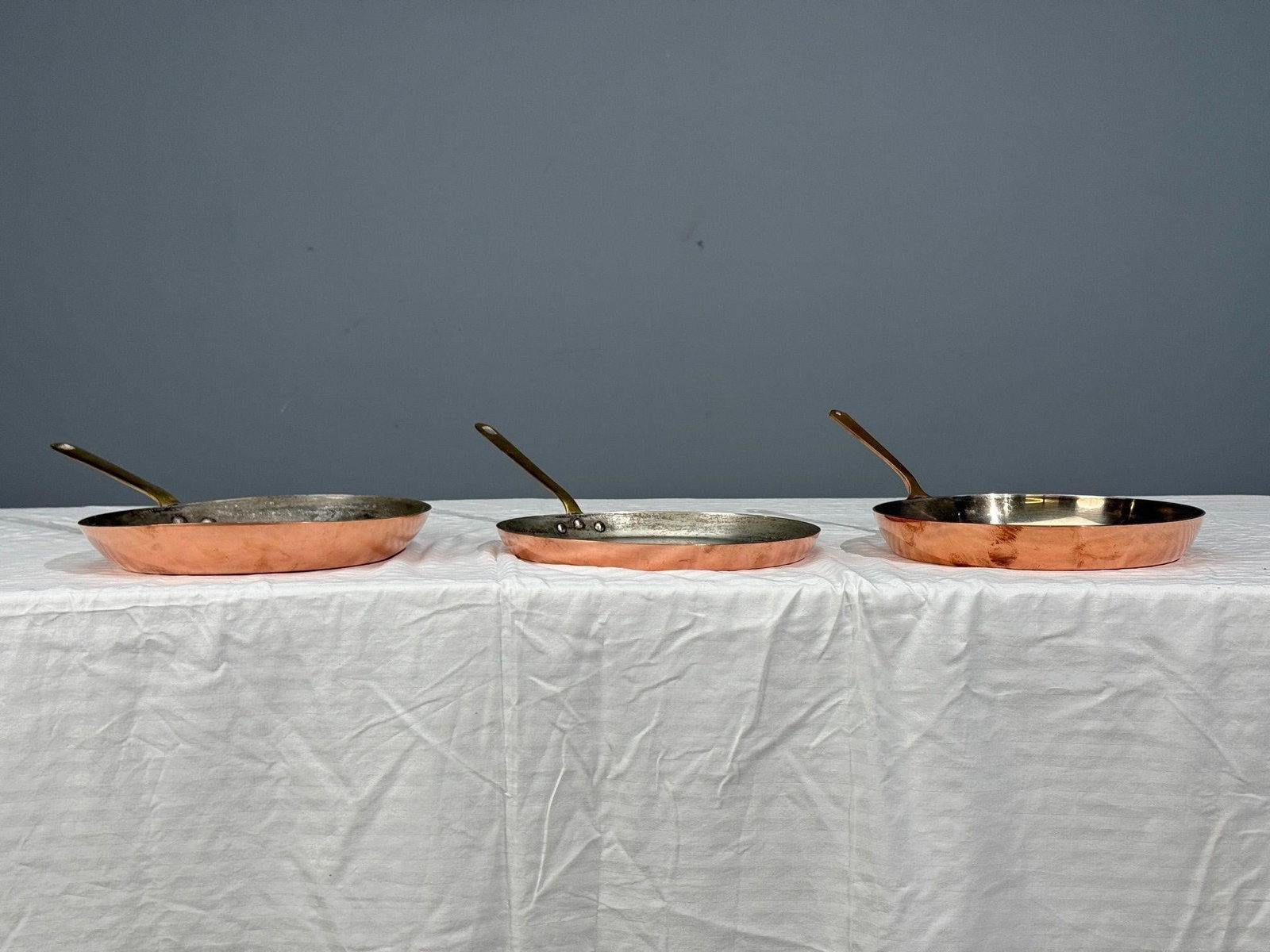 3 Lamalle Vintage Copper Pans with Brass Handles,: All marked and stamped Lamalle New York City, Made in France.H3.75, W12.25, D22 inches.Lamelle: H4.25, W11.75, D22inches.Fluer de le (high shine): H5,W11.5,D17 inches.