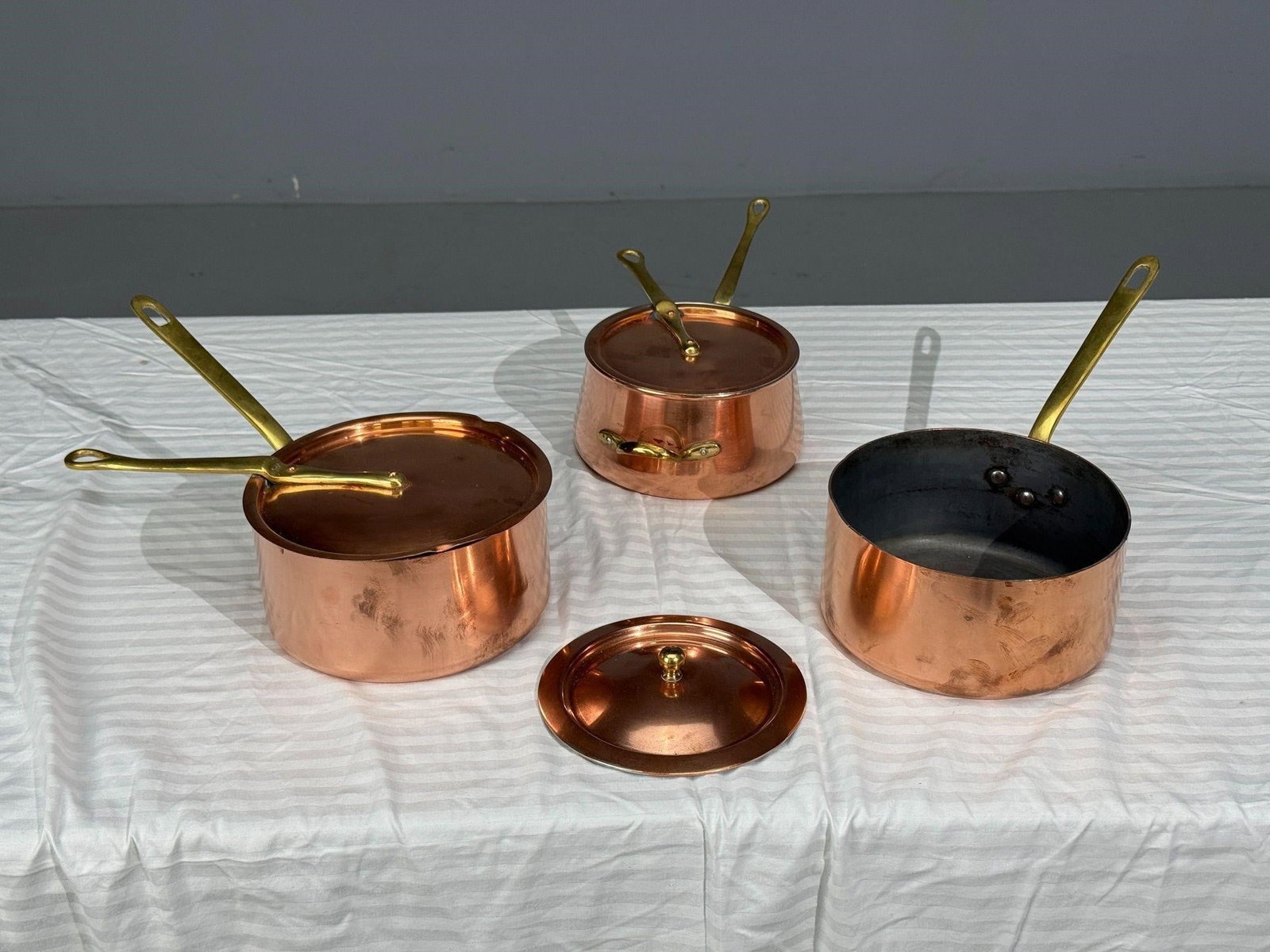 Vintage Copper Pots with Lids, Made in France: Professional-Grade Vintage Copper Pots with Lids, Stamped Made in France.H7.25, W8,D14.75 inches; Smaller one: H5.5 ,W7.5,,D13.75 inches.