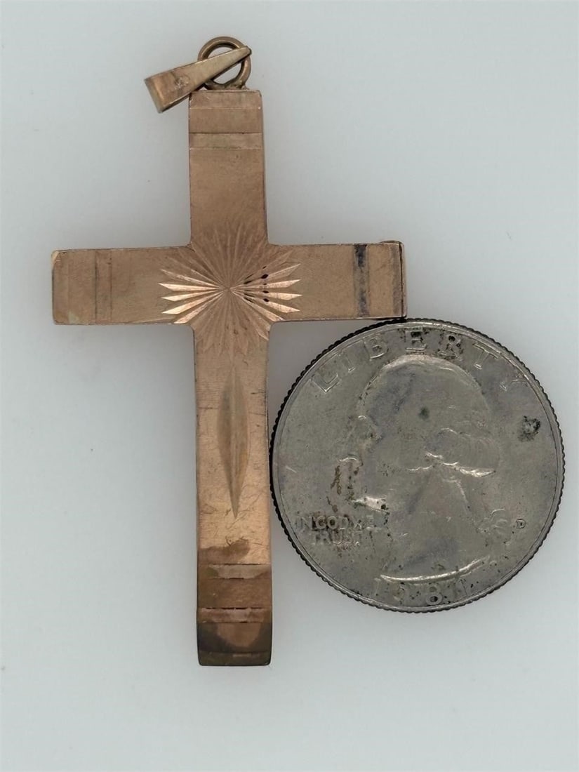 10K Yellow Gold Crucifix, 6.30 Grams,: A solid 10k yellow Gold Cross, Weighting 6.30 grams measuring 1.25 by 2.5