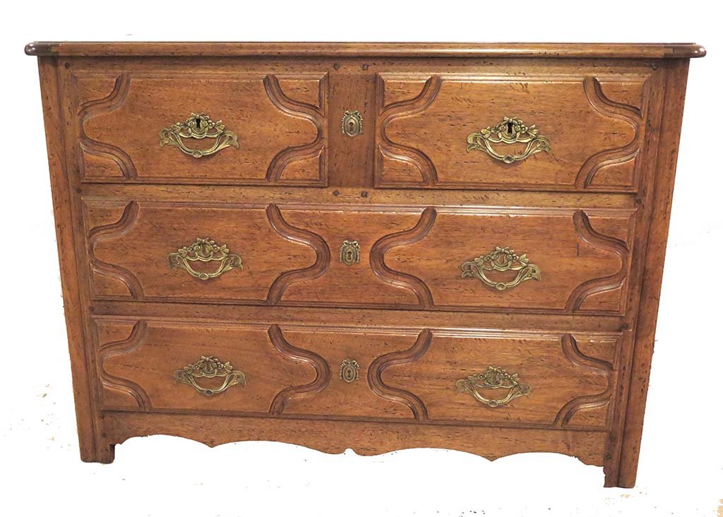 DON ROUSSEAU COMMODE: A Don Rousseau style carved commode. The rectangular top above two short drawers over two long drawers. Measures: 42" L x 20½" W x 30" H.