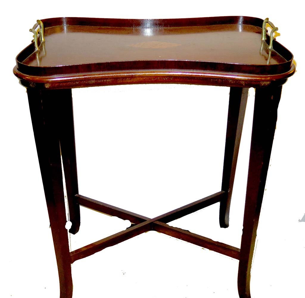 SERVING TABLE: The shaped top having an inlaid shell medallion above an X stretcher support raised on square tapering legs. Measures: 19½" L x 14" W x 26" H.