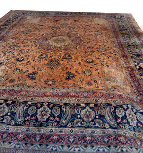 TABRIZ SILK CARPET: A exceptional handmade Tabriz silk carpet with eight guard borders in tones of navy salmon, ivory, brown and green on a rust ground. Central floral medallion. Tightly knotted. Good condition. Measures